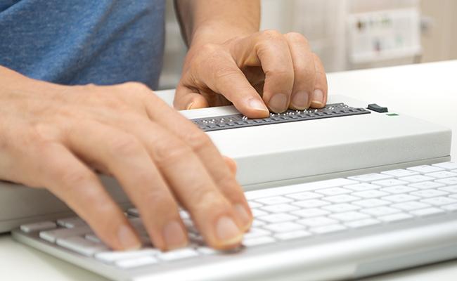 computer with braille display, keyboard